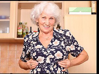 Grey haired grandma bonks her unshaved twat with a toy after making cookies